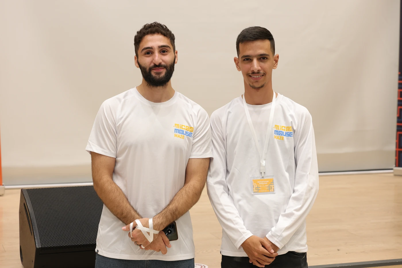 Mohammad and a fellow organizer at the Micromouse competition.